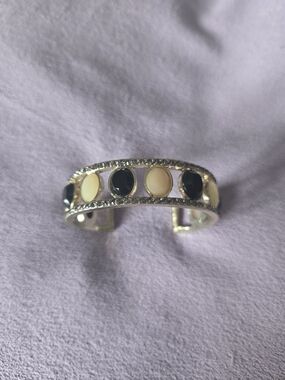 Silver-Tone Cuff Bracelet with Black and Cream Round Inlays
